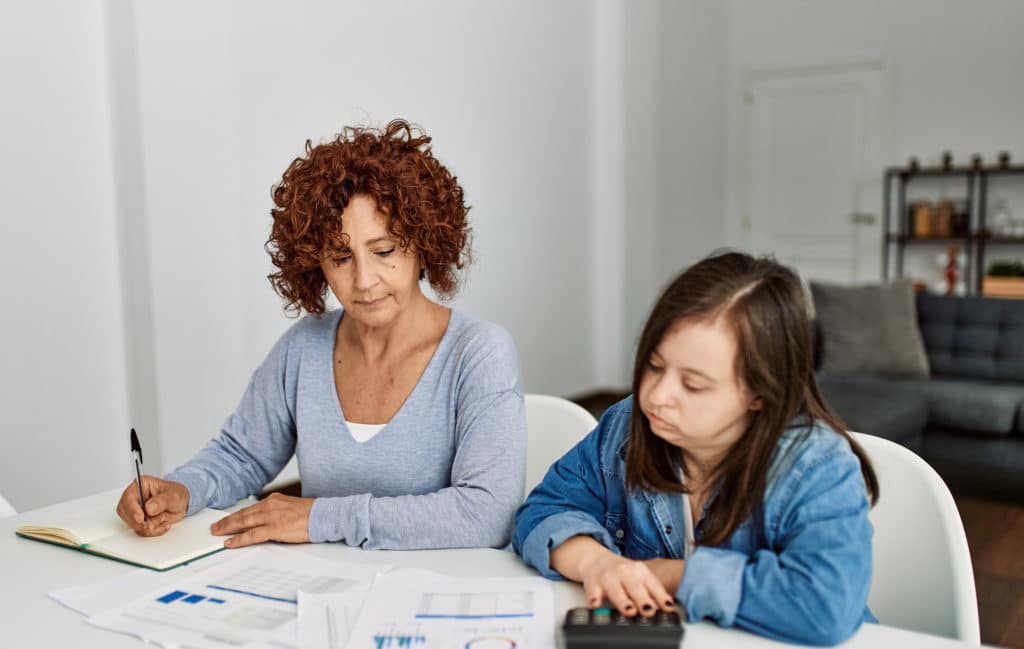 Two people doing their taxes who receive Social Security Disability